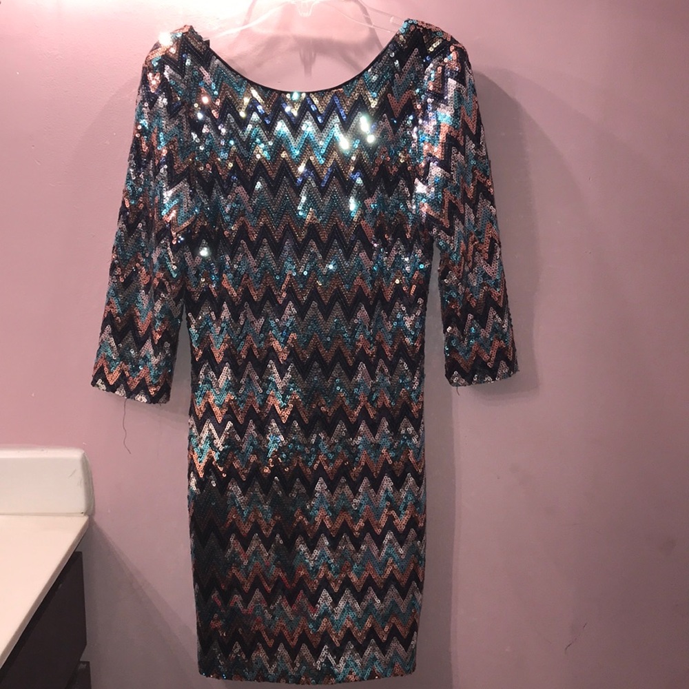 Glittery dress with open back